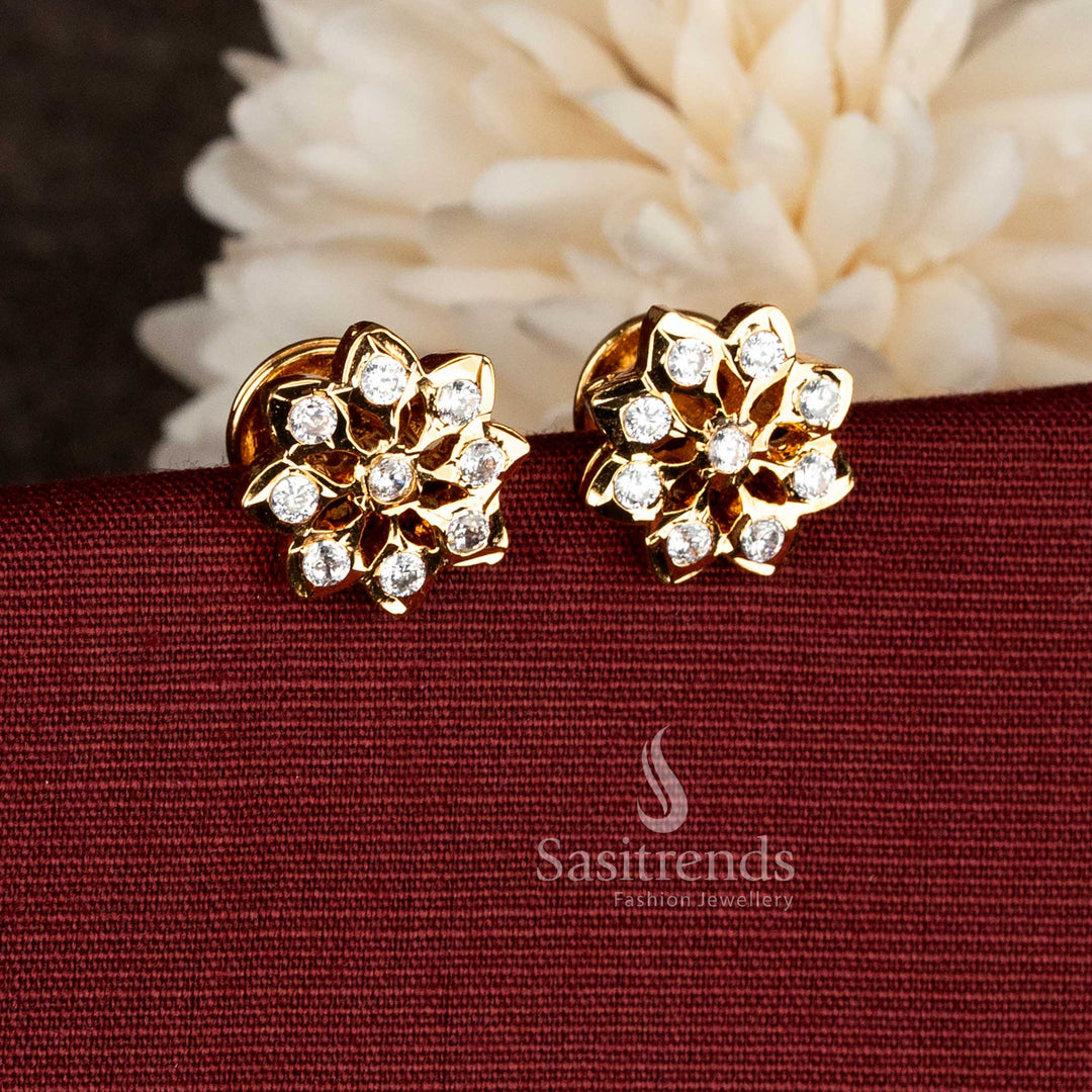 Radiant micro gold plated white starburst flower screw AD stud earrings crafted for polished heritage saree appearance with subtle shine and stylish detailing – Sasitrends