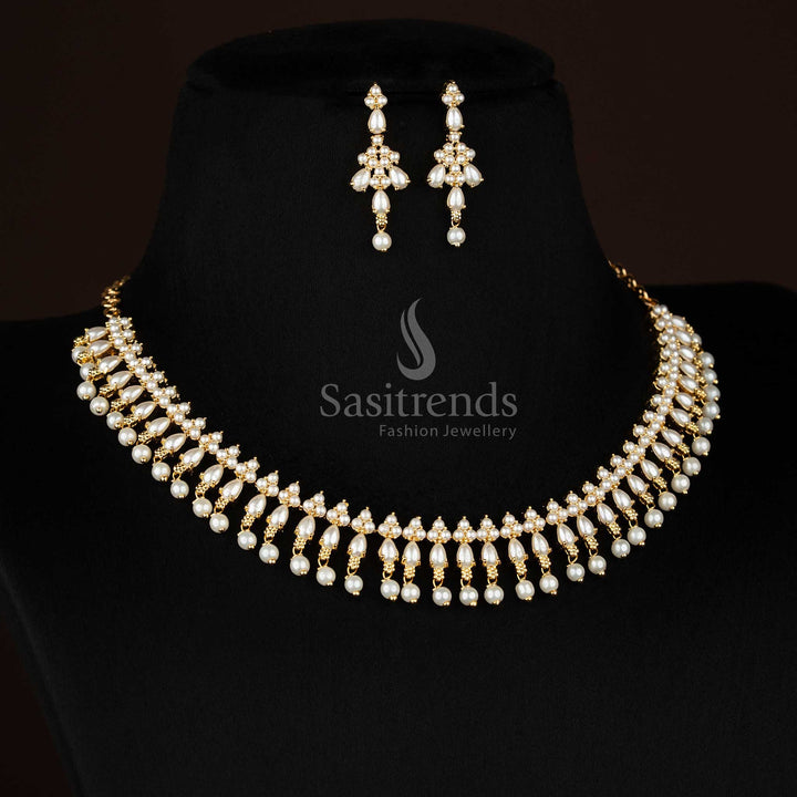 Opulent micro gold plated triangle cut pearl and teardrop American diamond necklace set finished with pearl drops for evening festives - Sasitrends