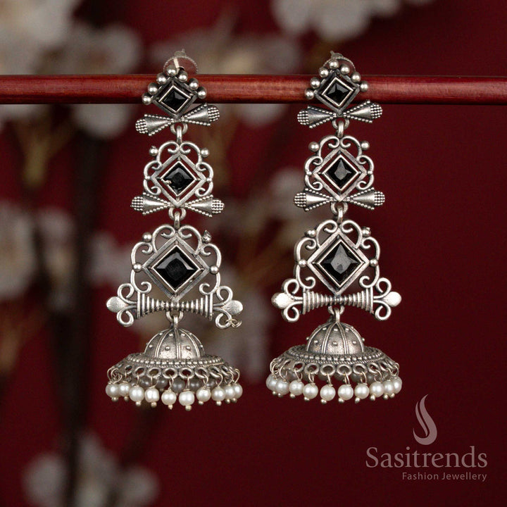 Deep black oxidised 92.5 silver geometric long jhumka earrings with stone highlights and pearl drops for ethnic styling - jewellery - Sasitrends