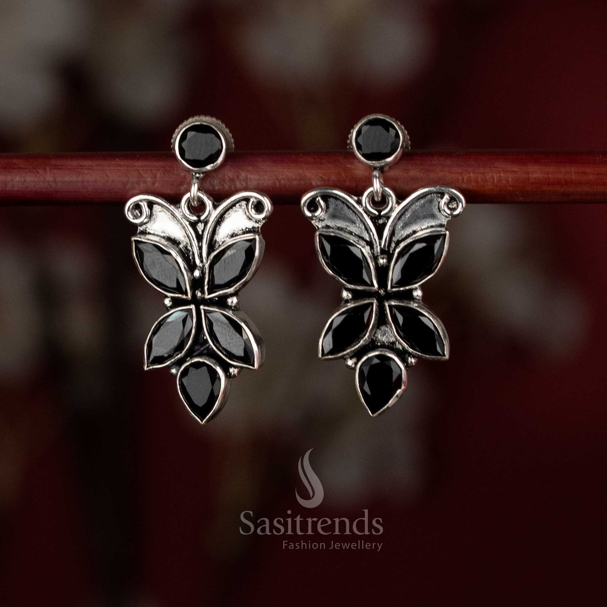 Shadow black butterfly motif earrings with fluid drift for elegant party styling – Sasitrends