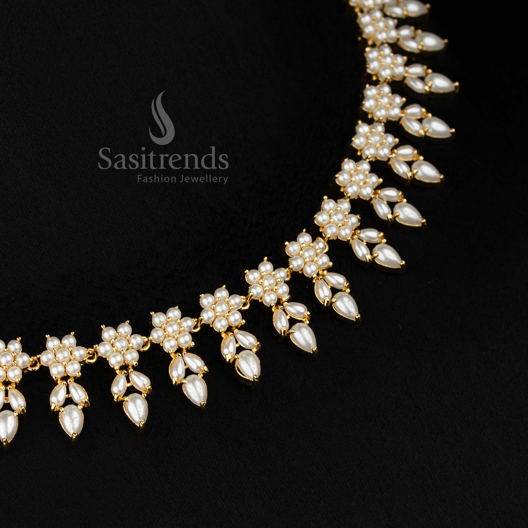 Silk Bloom styled micro gold plated floral teardrop leaf AD pearl necklace set suited for night styling occasions - Sasitrends