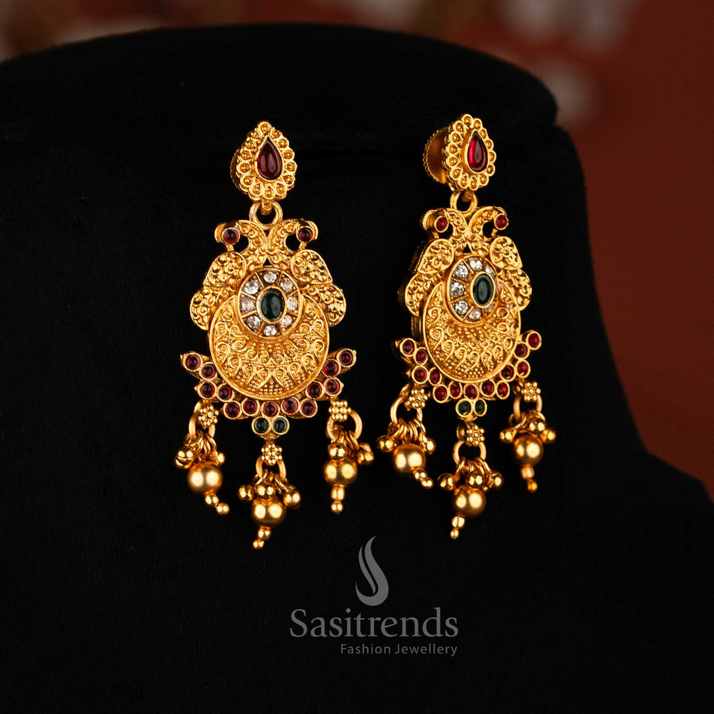 Classic matte gold plated dual peacock earrings in multi colours with oval and teardrop stones, golden beads for festive and ethnic wear jewellery – Sasitrends