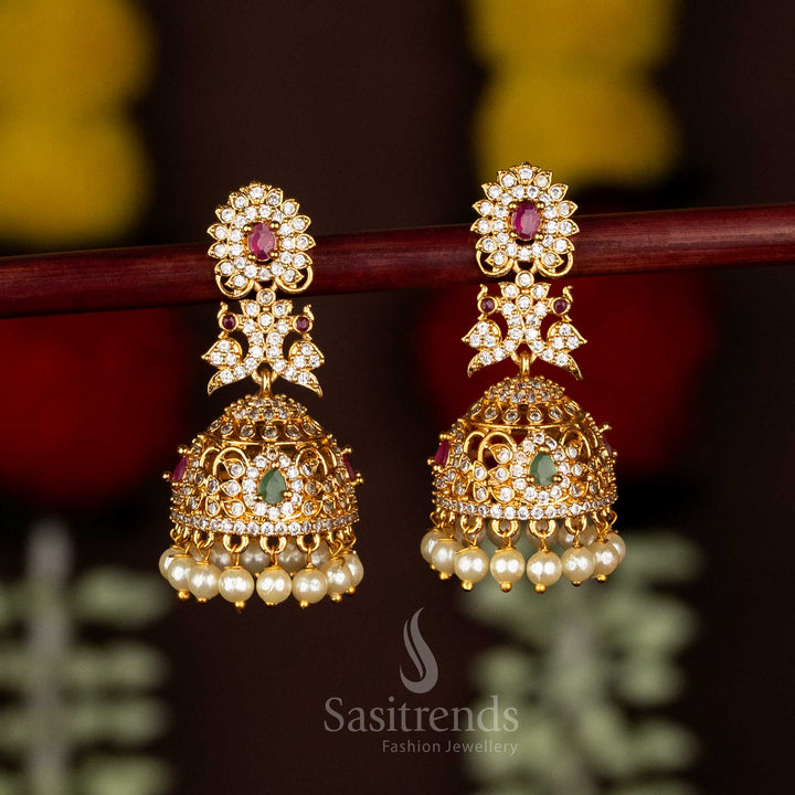 Divine Matte Gold Plated AD Stone Peacock Floral Jhumka Earrings with Pearl Drops – Bridal & Temple Wear Collection