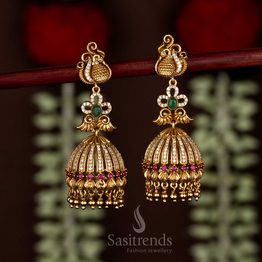 Regal multi matte gold plated peacock temple jhumka earrings with AD stones for grand wedding elegance – Sasitrends