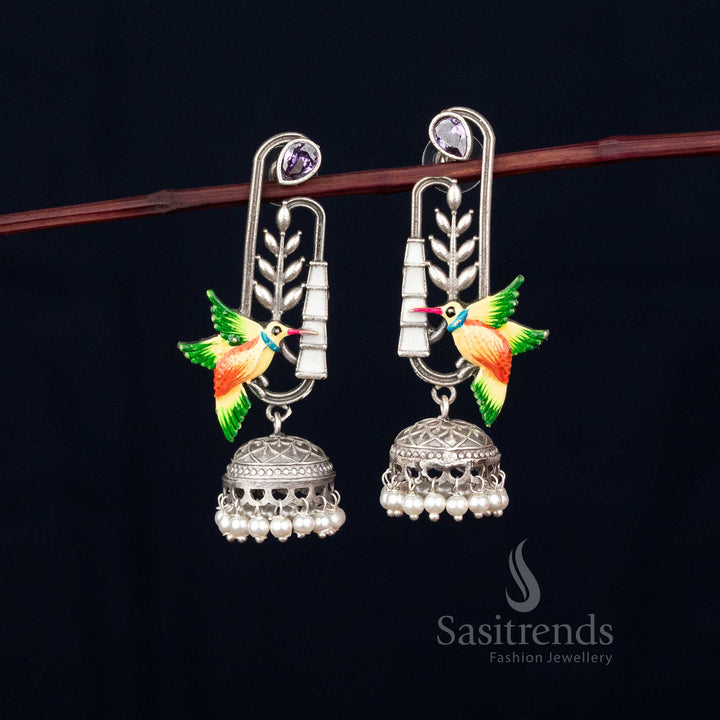 Celestial bird oxidised hand painted hummingbird jhumka earrings with leaf dangler and pearl dome for festive looks – Sasitrends