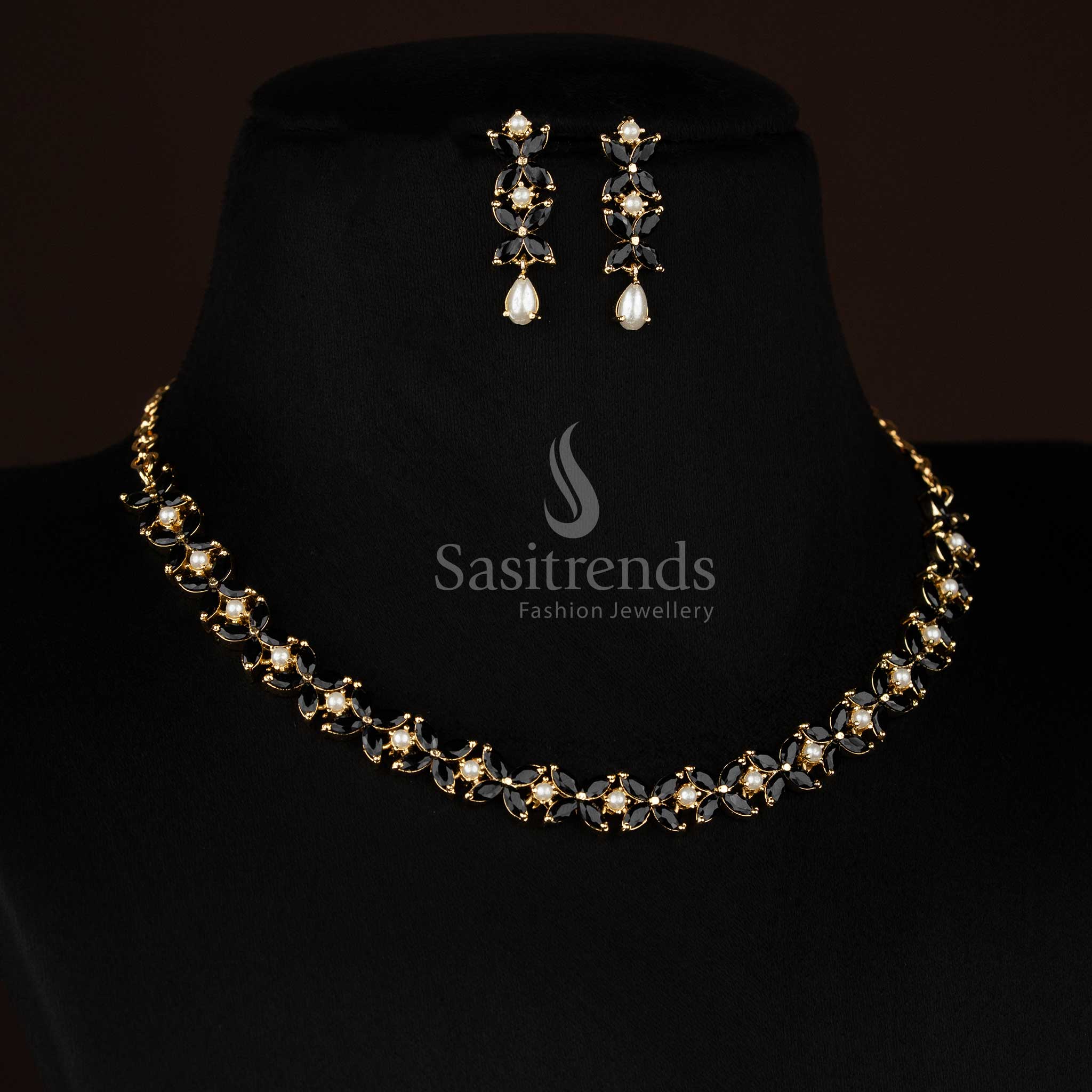 Elegant micro gold plated black four petal AD floral necklace set with pearls perfect for evening occasions and festive styling -Sasitrends