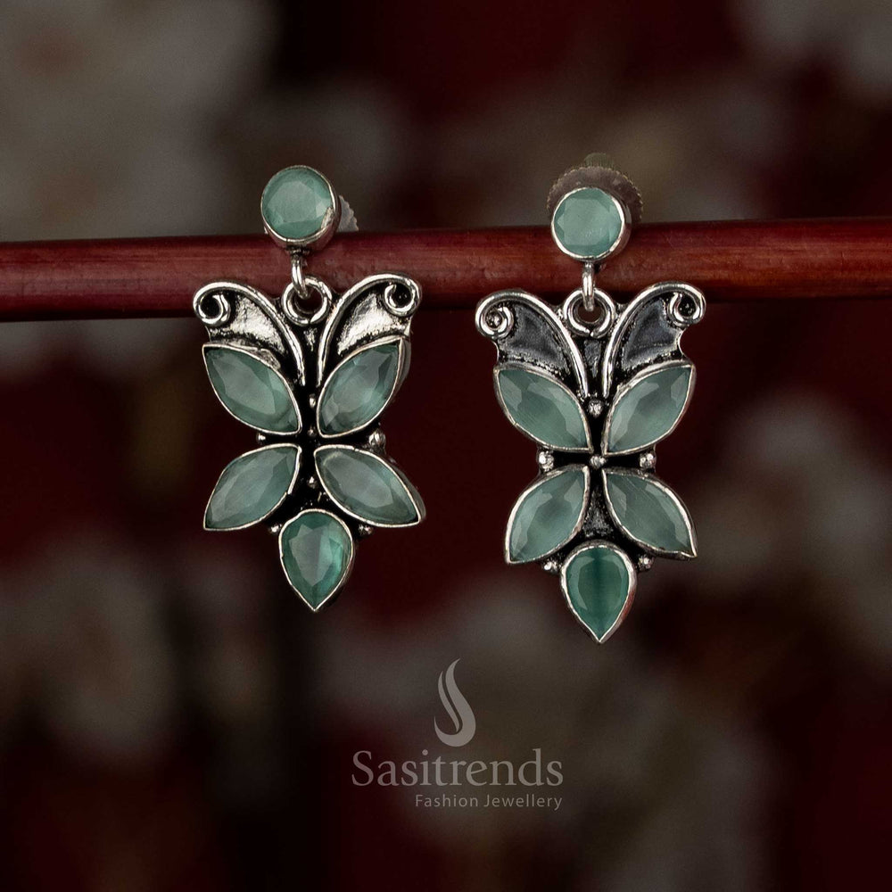 Celestial mint oxidised butterfly motif stone earrings for chic modern styling and evening wear – Sasitrends.