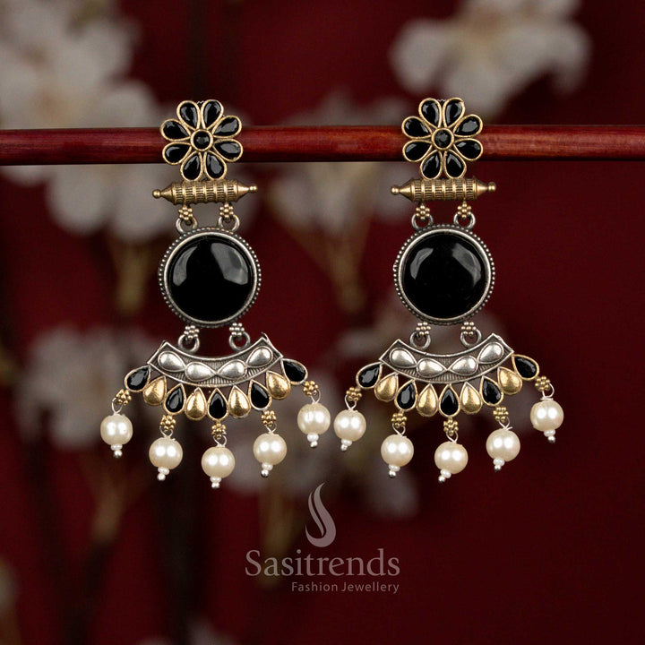 Antique oxidised silver earrings with black Monalisa stones, sculpted round crescent flower design and pearl cluster hangings for statement festive wear - Sasitrends