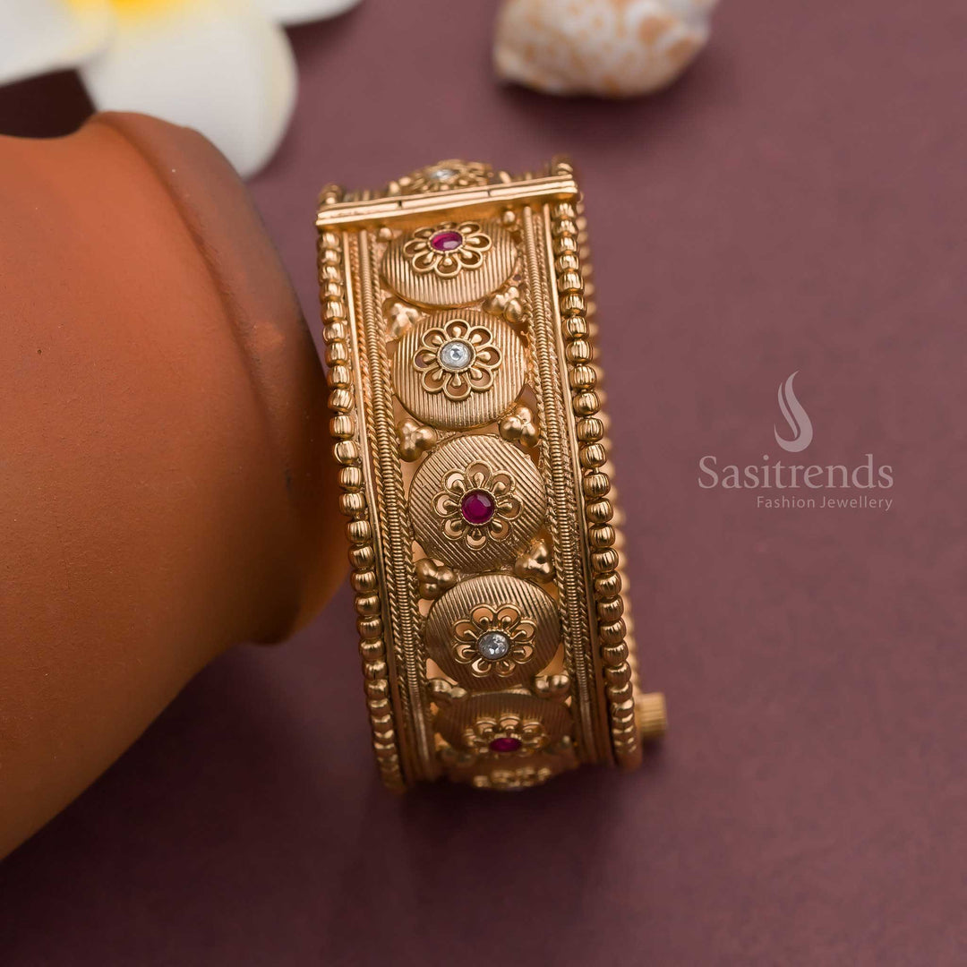 Trendy Bridal Antique Gold Plated Temple Kada Bangle with Floral Motif and Synthetic Stones Openable Pattern