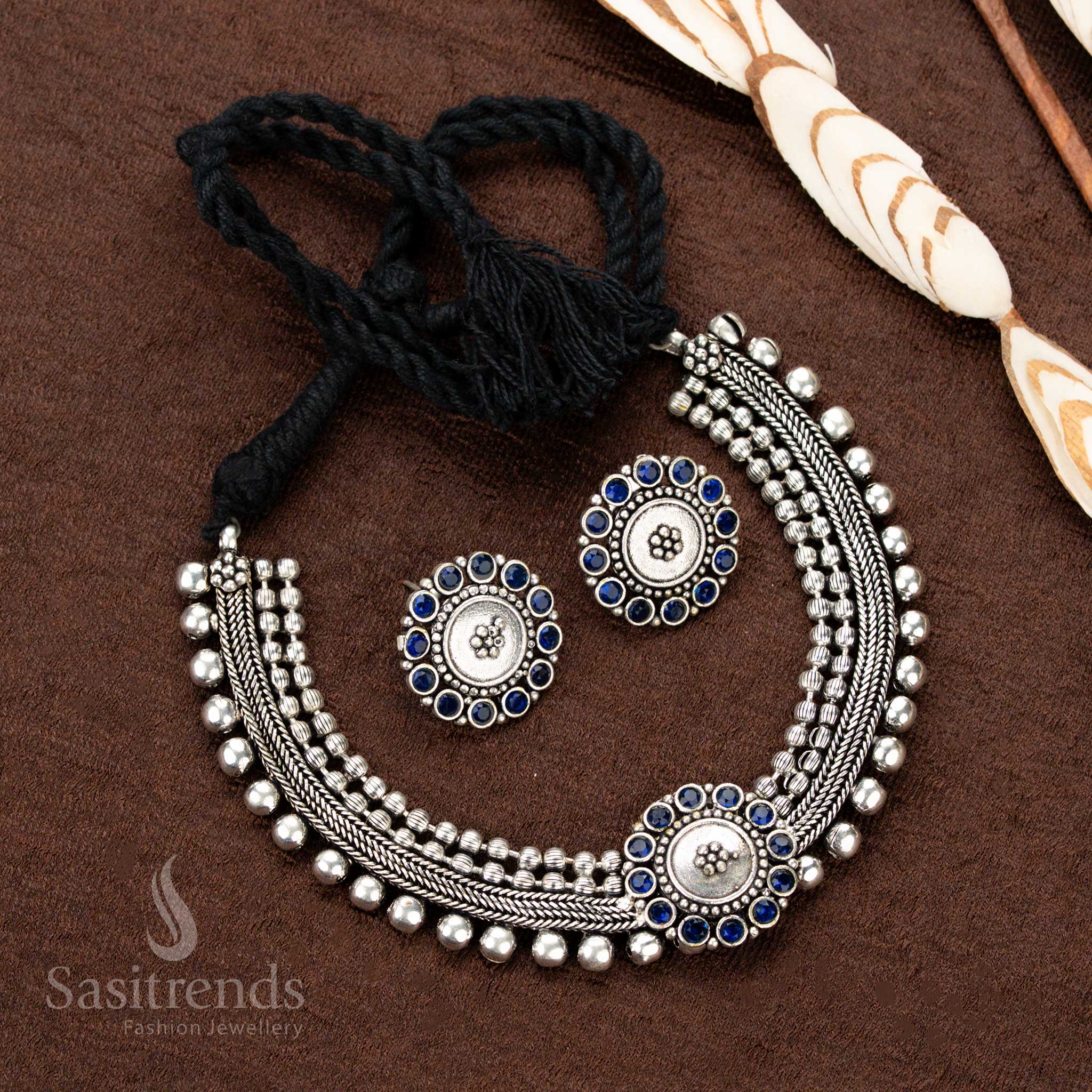 Oxidised jewellery choker with bold floral motif and matching earrings - Sasitrends