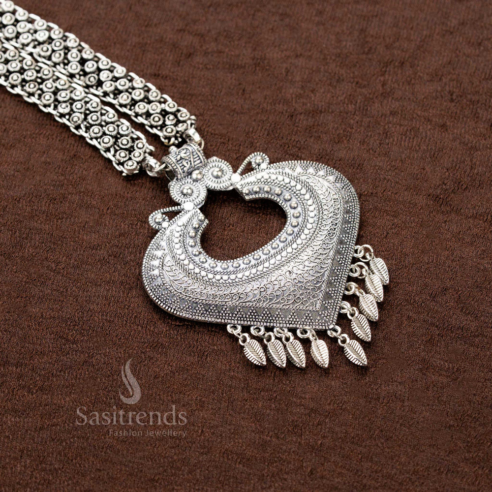 Oxidised tribal necklace with heart-shaped pendant, leaf danglers, and double floral chain – traditional Navaratri jewellery - Sasitrends