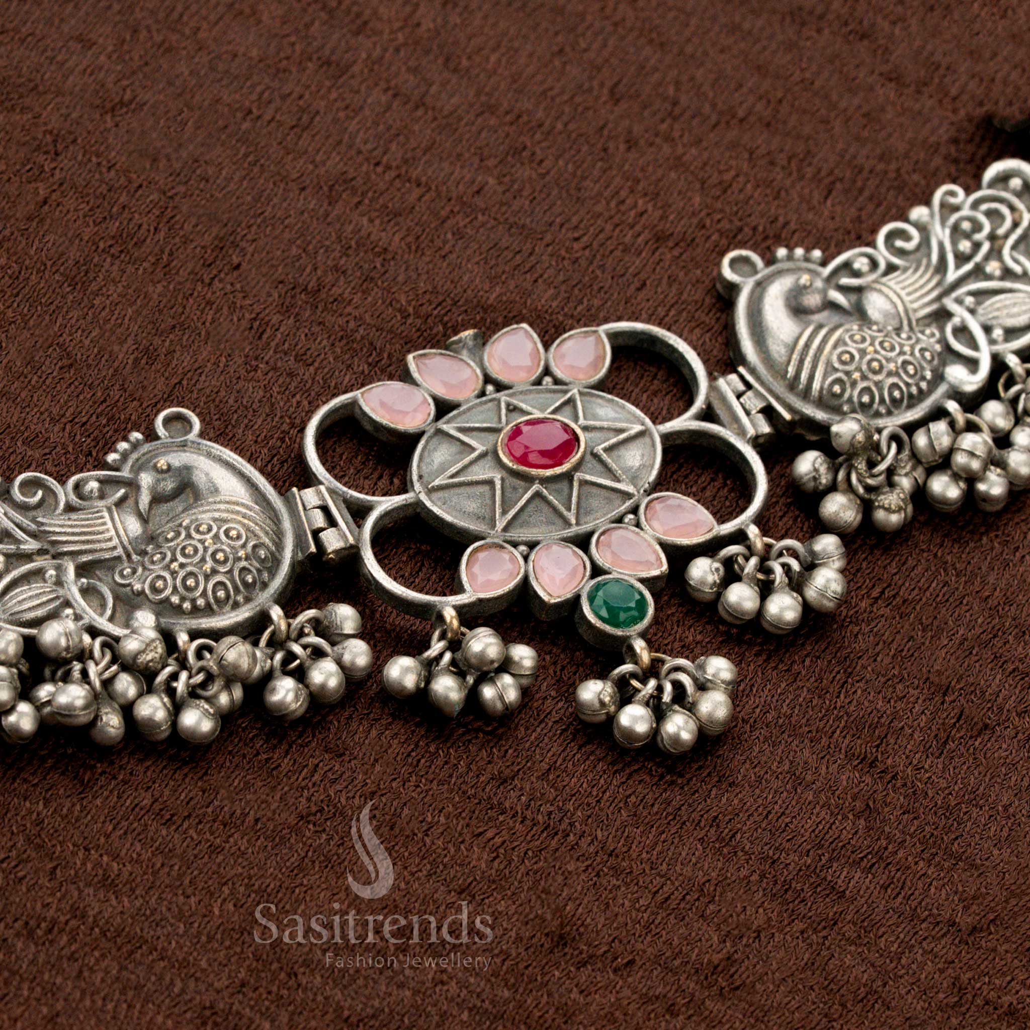 Beautiful oxidised Navaratri necklace set featuring twin peacock motifs, a detailed floral centrepiece, and enchanting pink-multicolour stone-studded teardrop elements — a festive jewellery piece ideal for sarees and cultural celebrations - Sasitrends