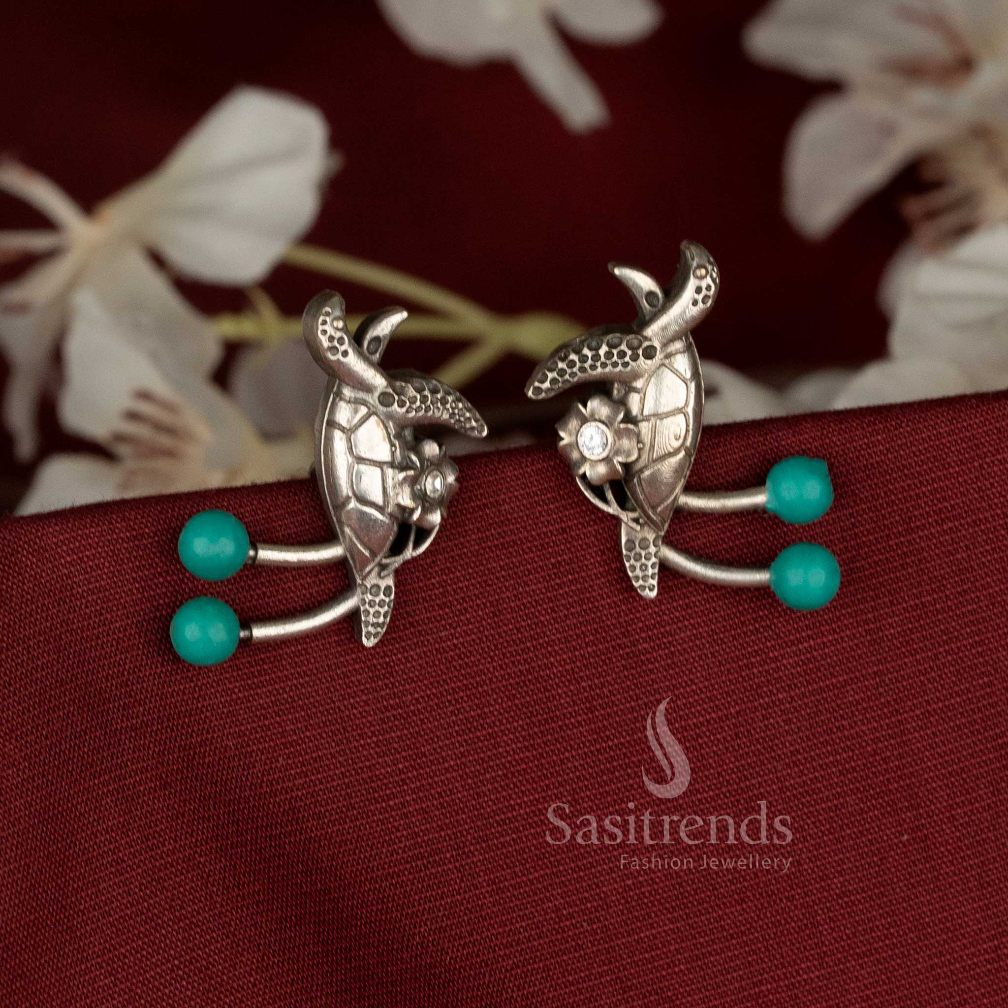 Seabreeze oxidised German silver walking turtle earrings featuring turquoise blue pearls and stone clusters, perfect for festive, casual, or office occasions – Sasitrends