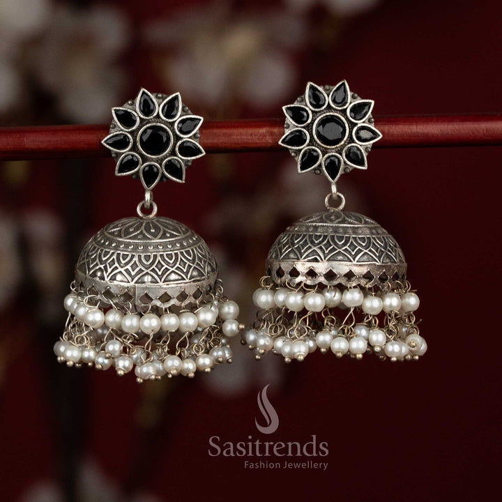 Raven heritage oxidised 92.5 silver black dome jhumkas with floral stone motifs and pearl fringes for party charm - jewellery - Sasitrends