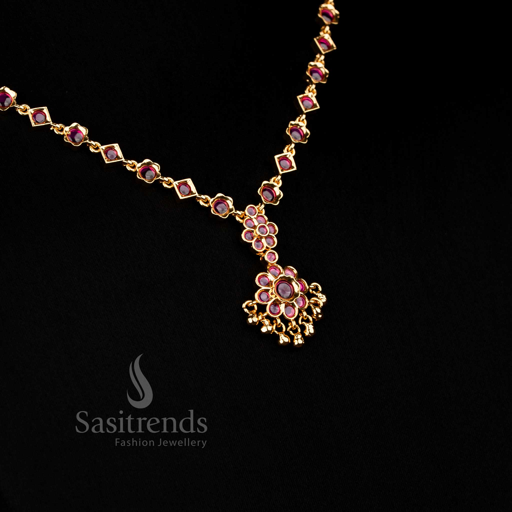 Majestic ruby American Diamond floral necklace with deep sparkle stones and golden bead details suitable for bridal occasions Jewellery - Sasitrends