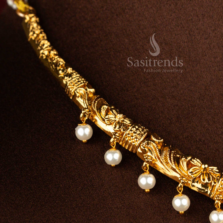 Radiant aura premium matte gold temple Gajalakshmi centrepiece necklace showcasing Lakshmi deity with peacock nakshi engraving and vibrant multi stone accents for heritage festivities – Sasitrends