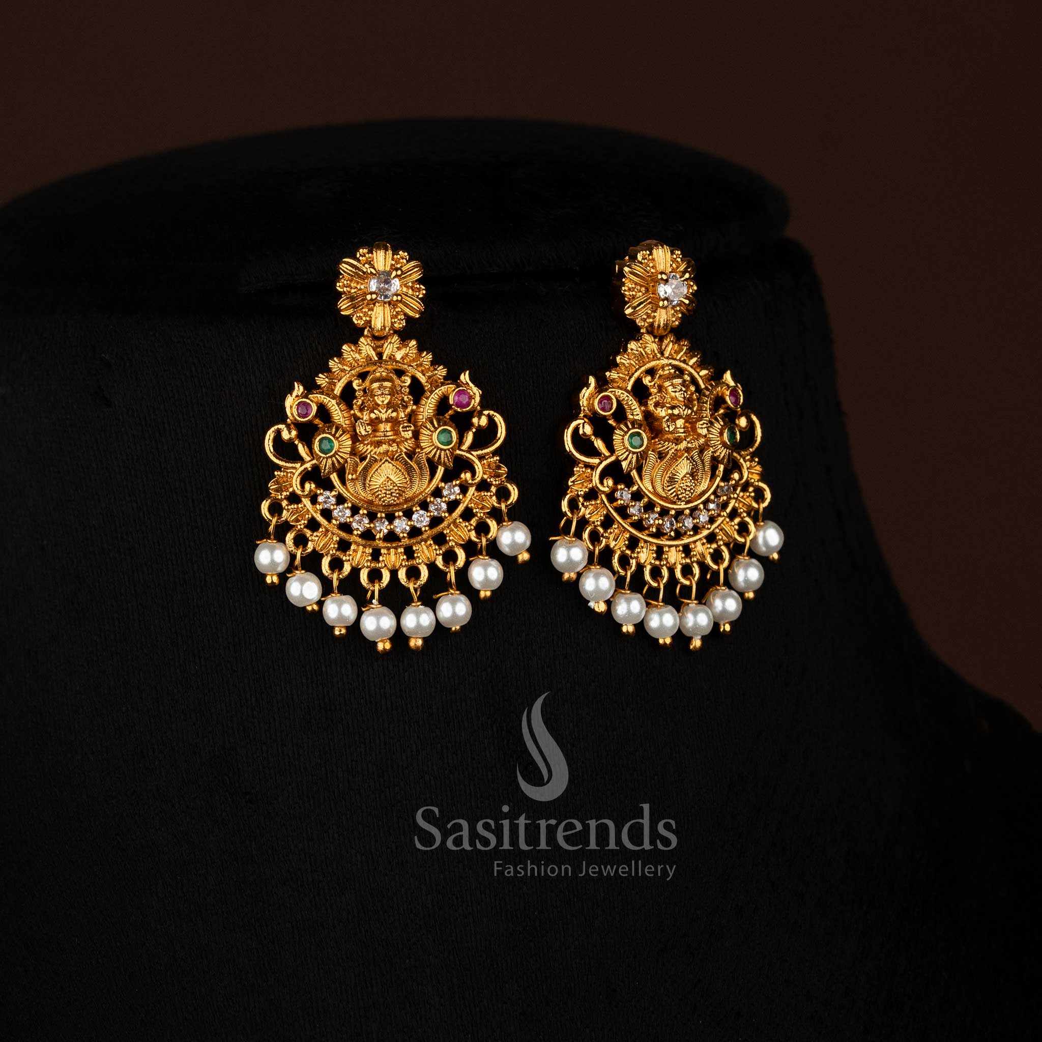 Celestial matte gold plated dual peacock earrings featuring Lakshmi lotus floral design with multi-stone accents, ideal for cultural ceremonies and festive jewellery - Sasitrends