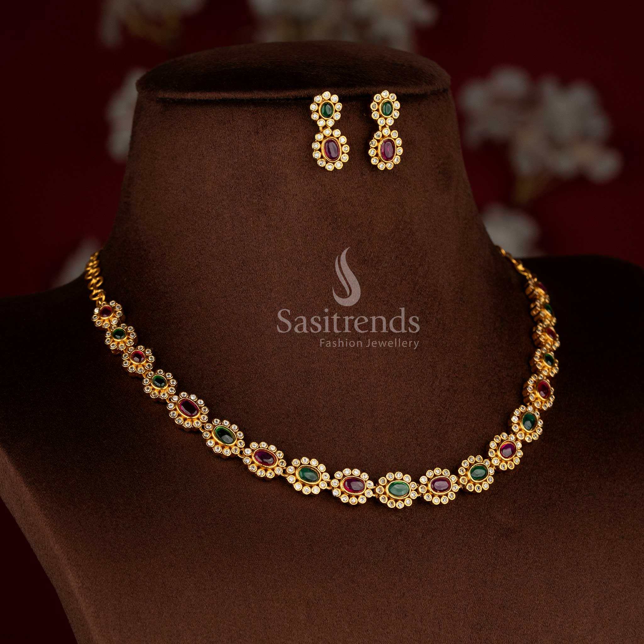 Elegant matte gold plated ruby-green oval floral AD necklace set with matching earrings for stylish festive and evening looks – Sasitrends
