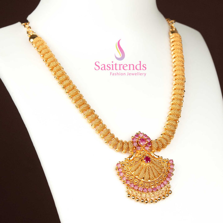 Majestic ruby AD necklace featuring one gram micro gold plating, tilak motif and polished finish that enhance its celebratory brilliance – Sasitrends