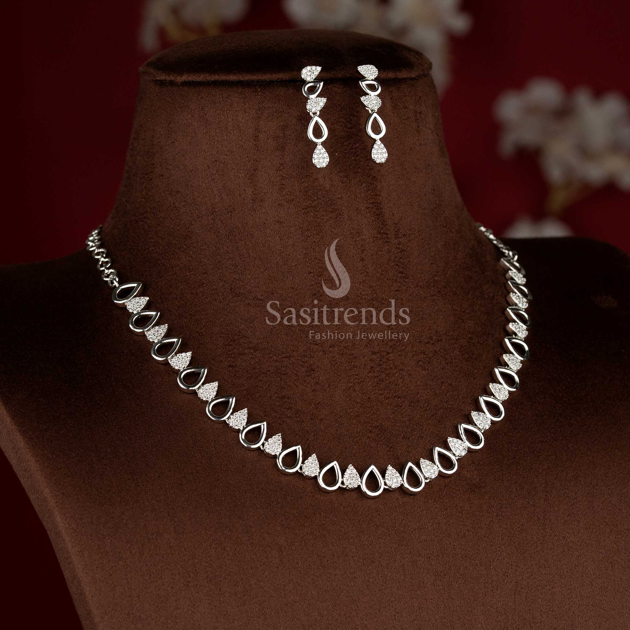 Elegant party wear American diamond rhodium silver plated white teardrop necklace set with matching earrings for celebration-ready looks – Sasitrends