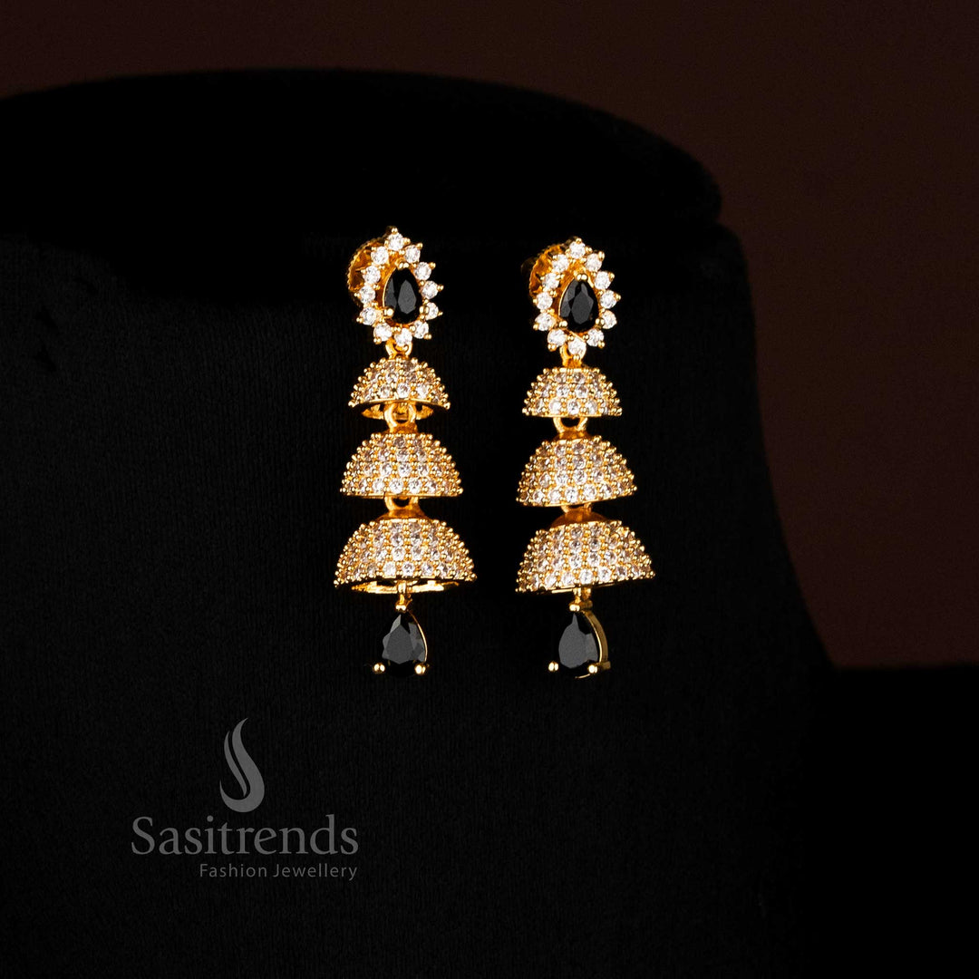 Regal White-Black Gold Plated American Diamond Triple Layer Bell Jhumka Earrings Crafted for Premium Traditional and Bridal Jewellery – Sasitrends