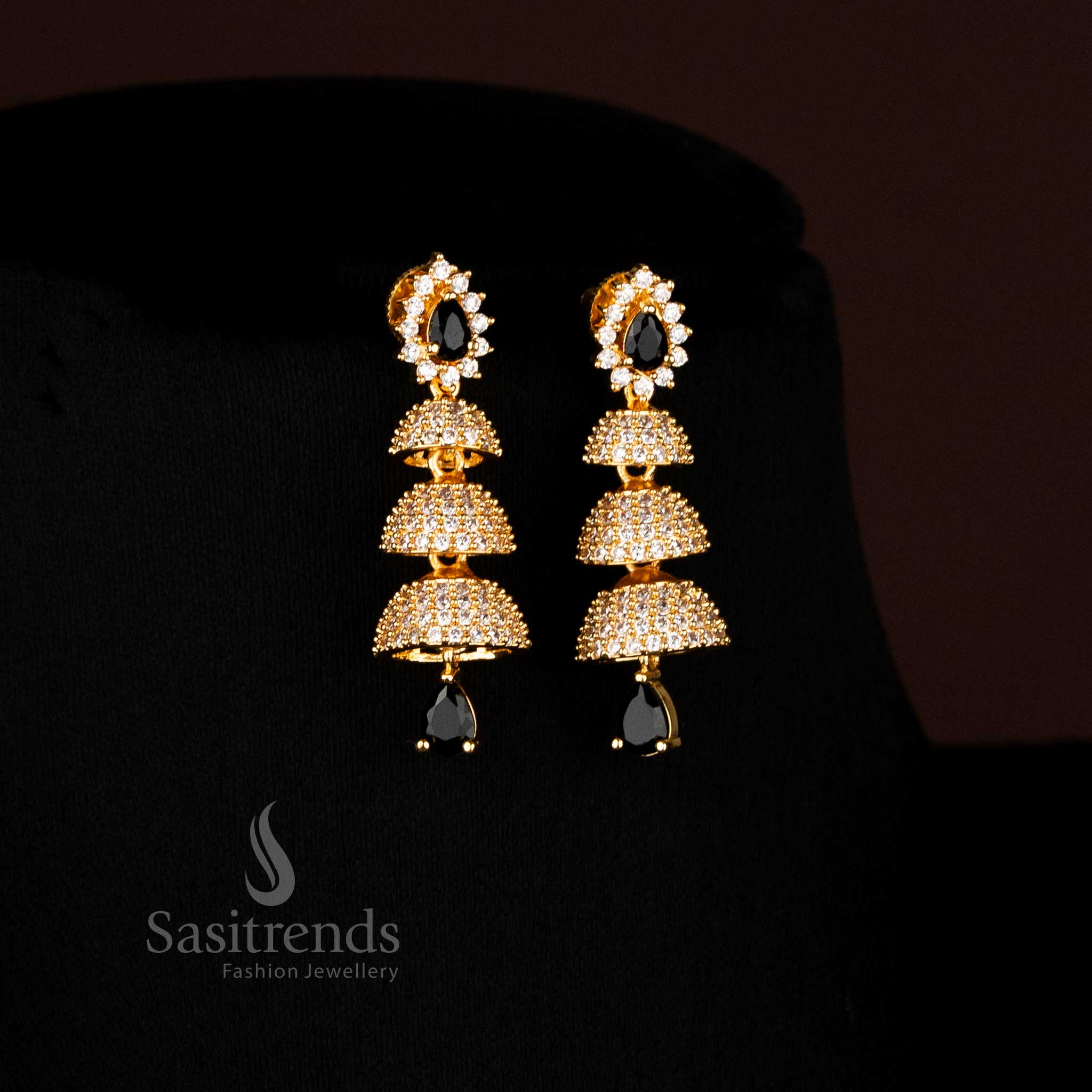 Regal White-Black Gold Plated American Diamond Triple Layer Bell Jhumka Earrings Crafted for Premium Traditional and Bridal Jewellery – Sasitrends