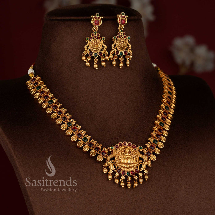 Royal matte gold plated kemp peacock Lakshmi necklace set in ruby green combination suited for bridal wear and temple functions – Sasitrends