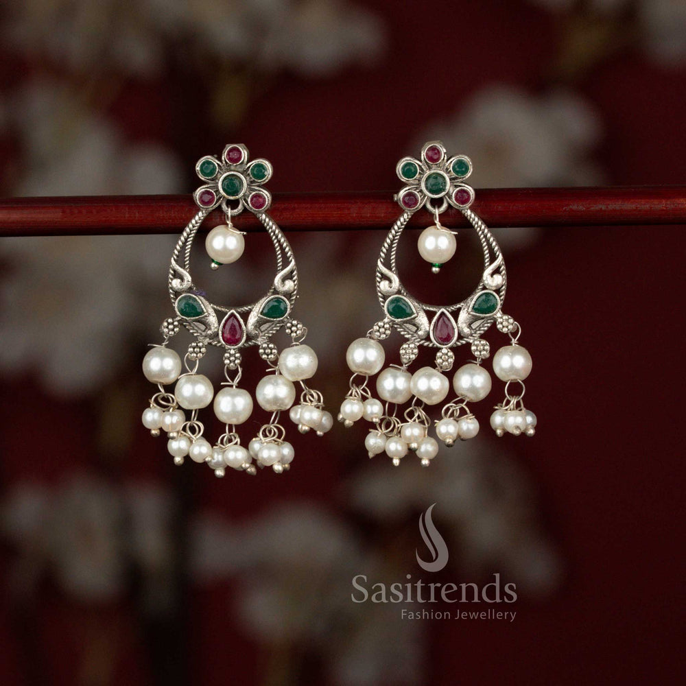 Stunning oxidised peacock chandbali earrings adorned with ruby green sparkle and pearls perfect for ethnic styling – Sasitrends