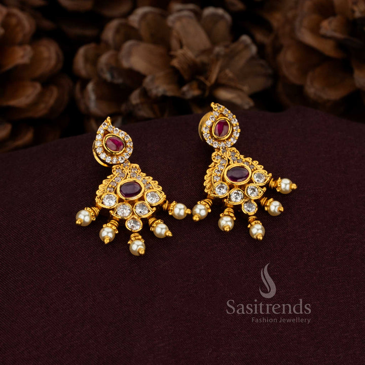 Resplendent White Ruby Paisley Earrings Featuring Celestial Gold Plating With Radiant Pearl Accents – Exquisite Regal Jewellery Made For Noble Weddings And Cultural Grandeur – Sasitrends