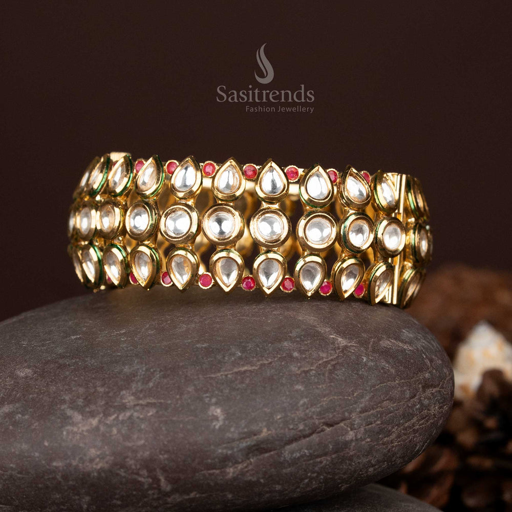 Graceful high gold plated kundan bangles with red embellishments, designed to elevate traditional ensembles with poise and charm – Sasitrends