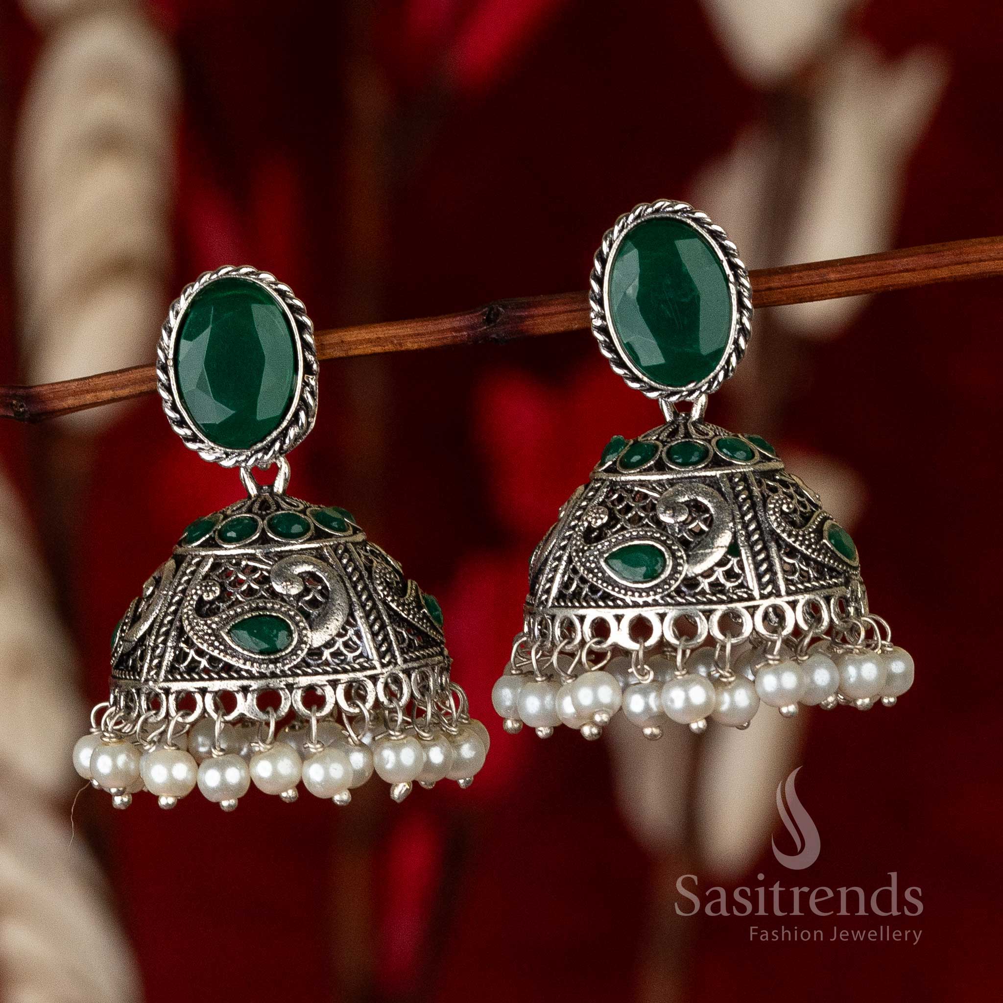 Oxidised German Silver Peacock Jhumka Earrings With Green Stone