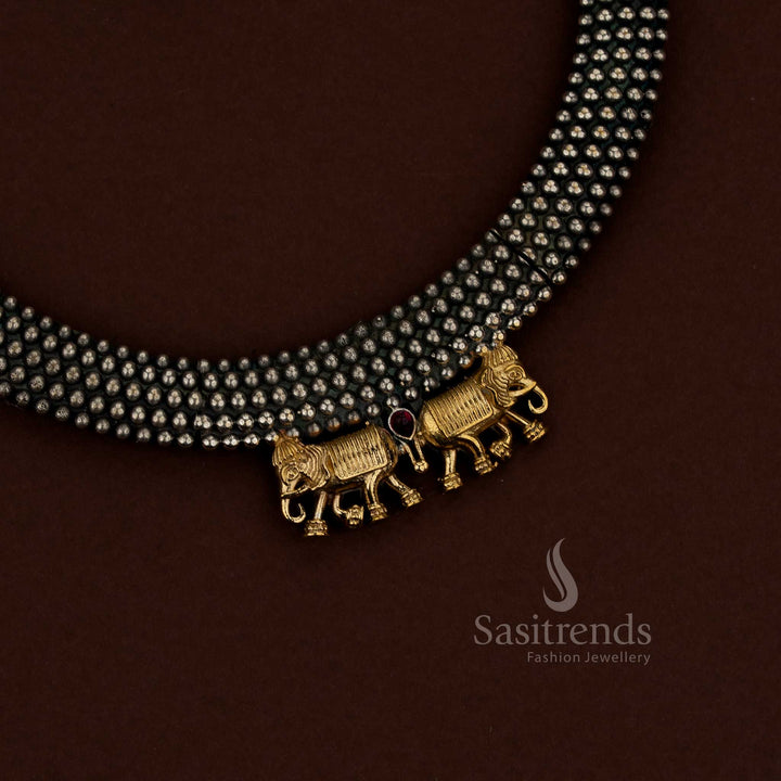 Artisan crafted oxidised ruby dual tone elephant Gaja husli choker ornament for cultural festive wear - Sasitrends