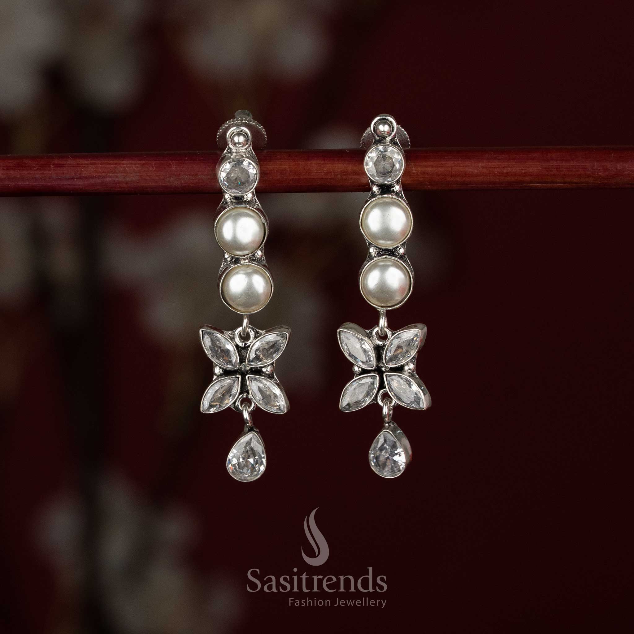 Graceful oxidised silver pearl-white floral line drop earrings ideal for simple daily dressing and routine office looks – Sasitrends