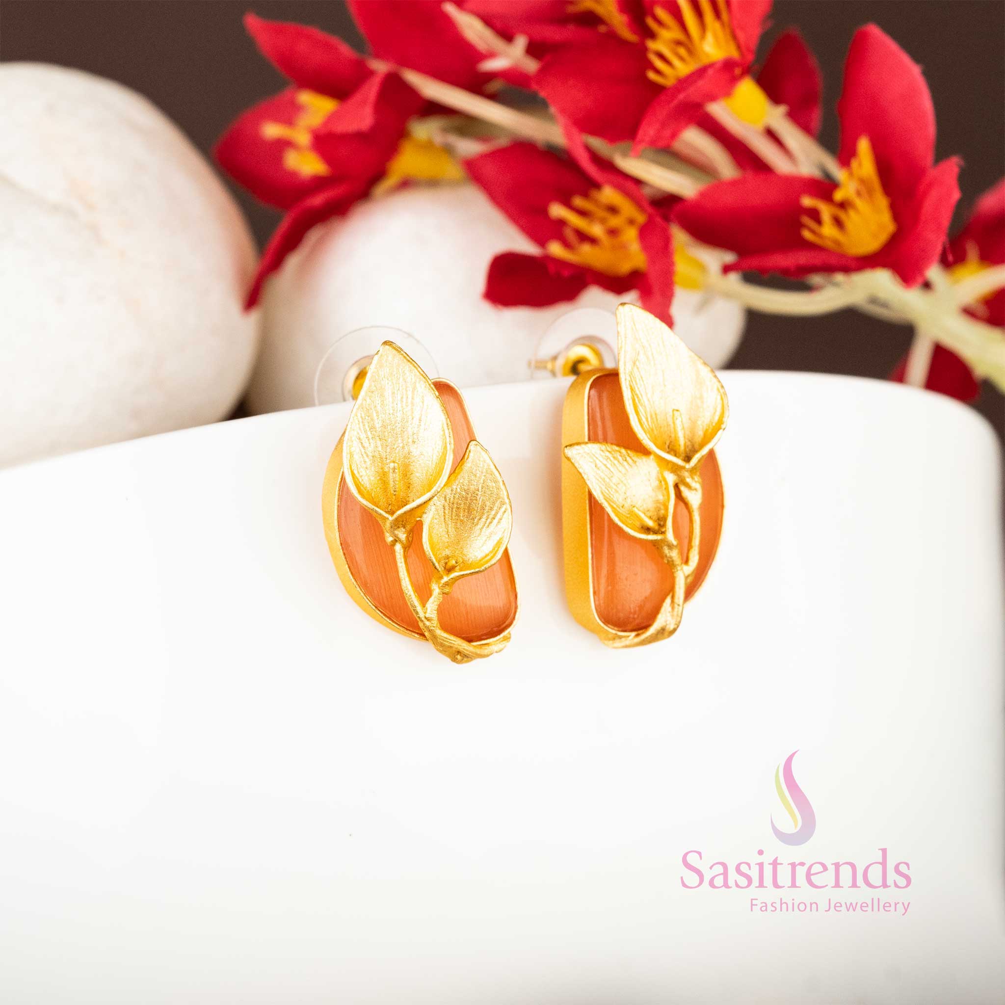 Party Wear Gold Plated Push Back Leaf Pattern Peach Stone Studded Earrings