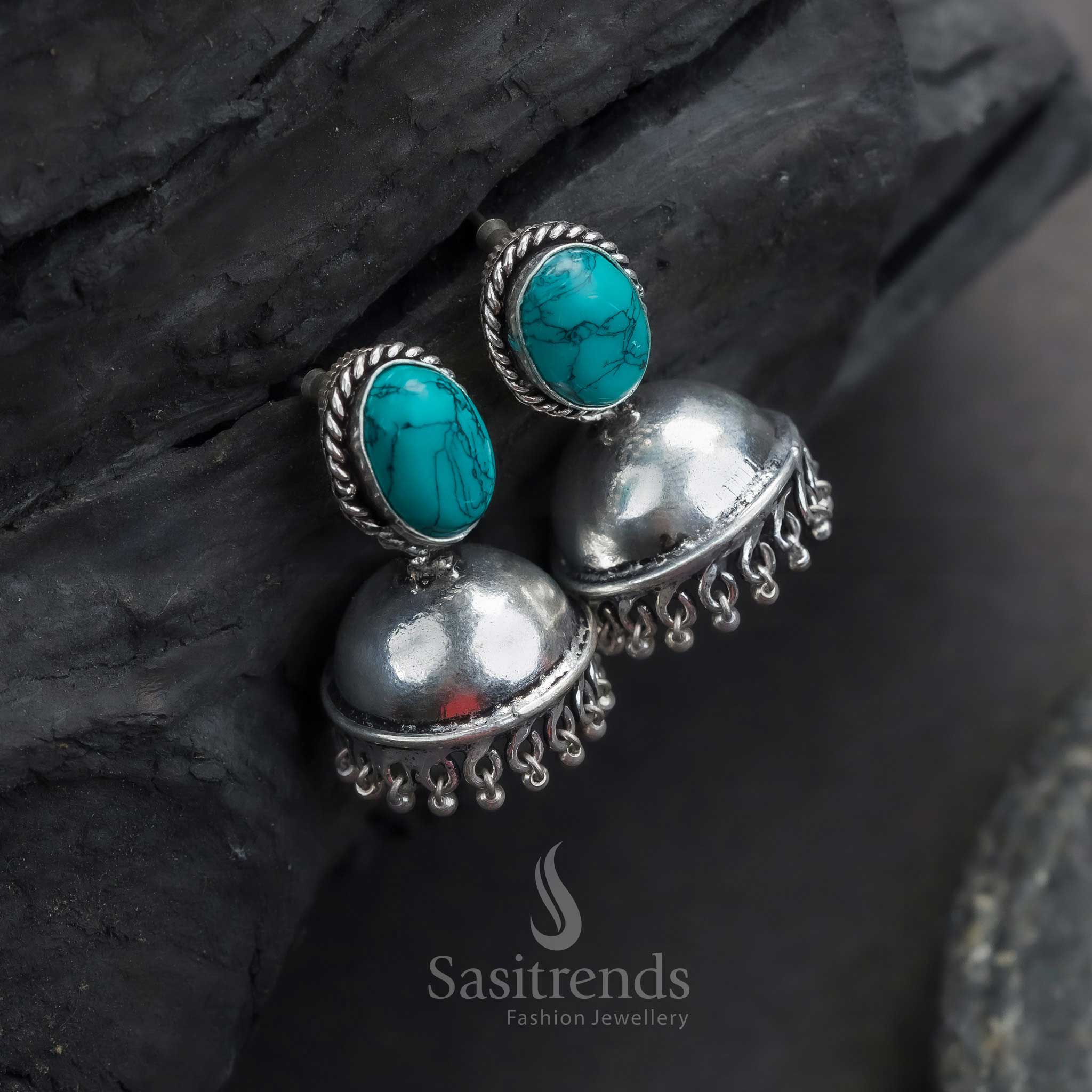 Trendy traditional oxidized German silver jhumkas with Monalisa stones in elegant black, perfect for women's fashion statements.