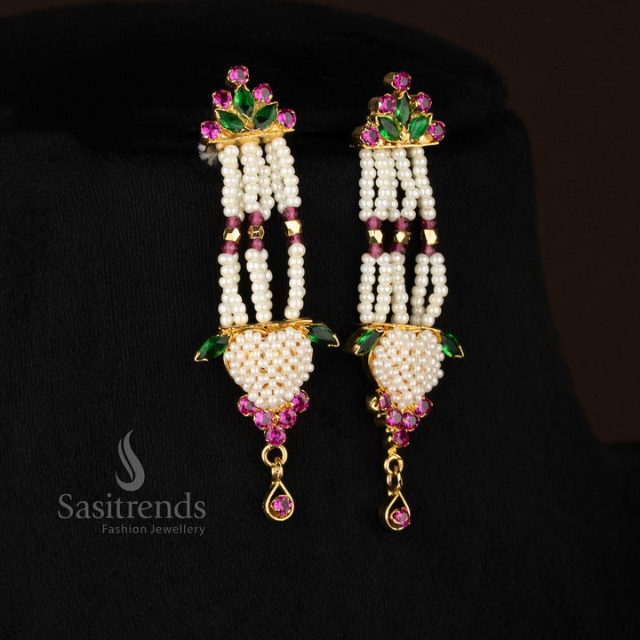 Luxurious pearl ruby green American Diamond butterfly wings pearl earrings suited for premium fashion styling - Sasitrends