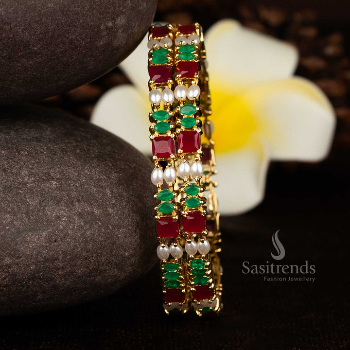 Grand pearl, ruby and green cluster embellished 24K micro gold plated multi-row bangles offering premium real gold finish jewellery for traditional festivities – Sasitrends