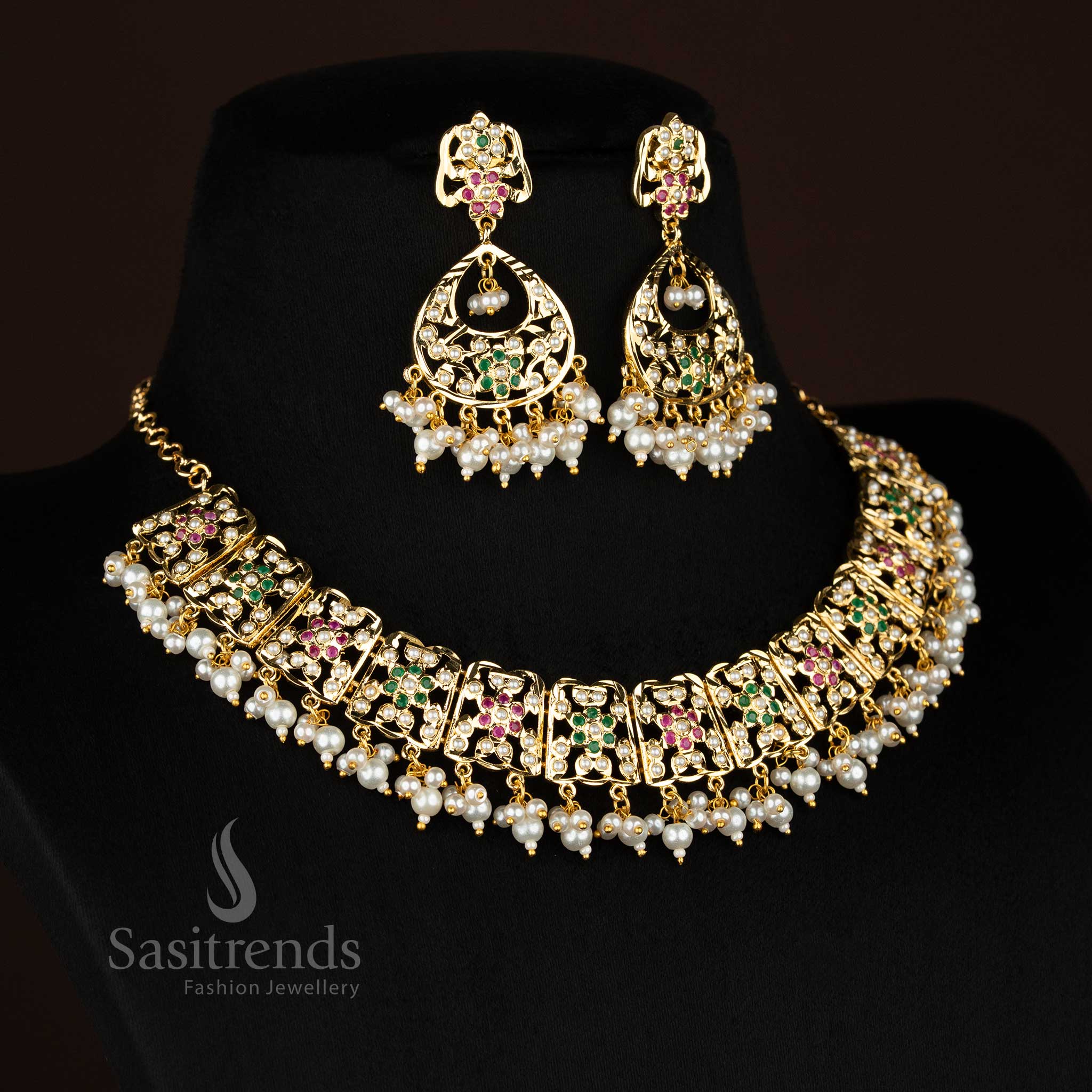 Pearl ruby green RoyalPetals Punjabi jadau gold plated flower pearl necklace set designed for traditional functions and joyful celebration wear - Sasitrends
