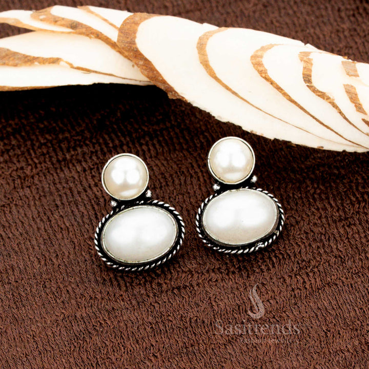 Oxidised German silver Pearl oval Monalisa stud earrings designed for women with a love for fusion fashion—a simple, minimalist jewellery design that complements both Indo-western and traditional outfits - Sasitrends