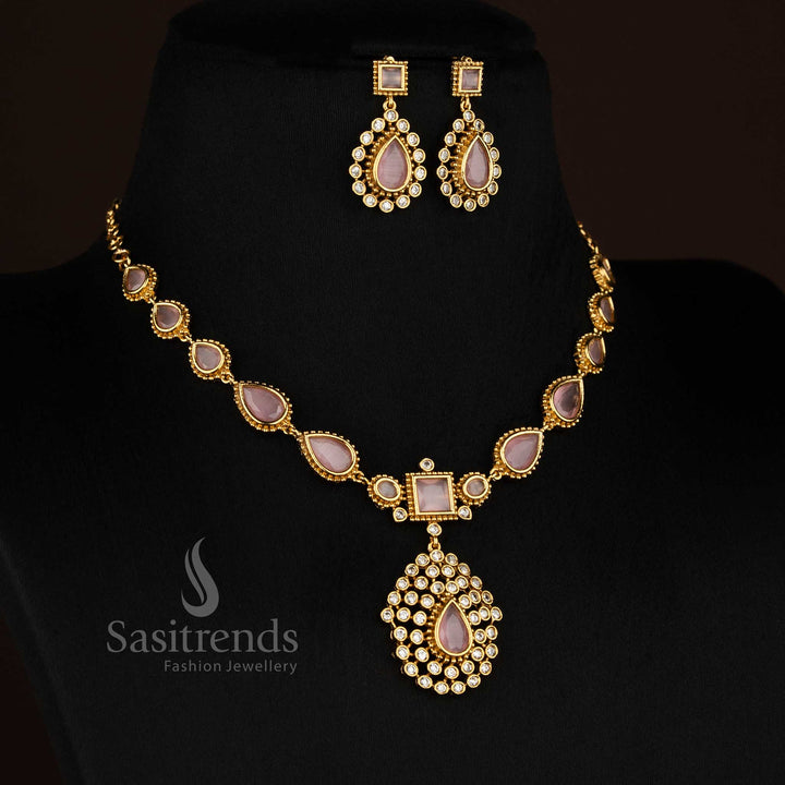 Elegant pink American Diamond teardrop stone matte gold plated short necklace designed for festive celebrations - Sasitrends
