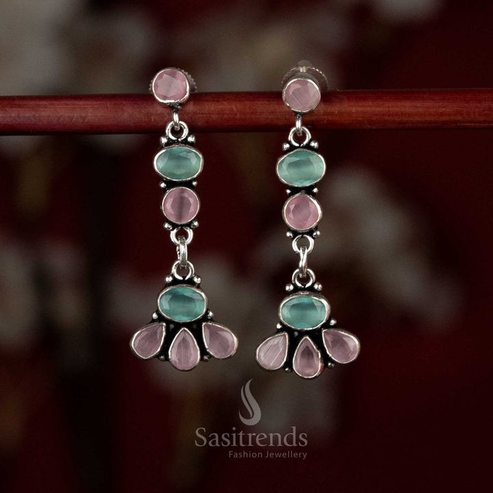 Pink-mint oxidised silver earrings showing dual-tone vertical floral elements and soft layered drops – Sasitrends