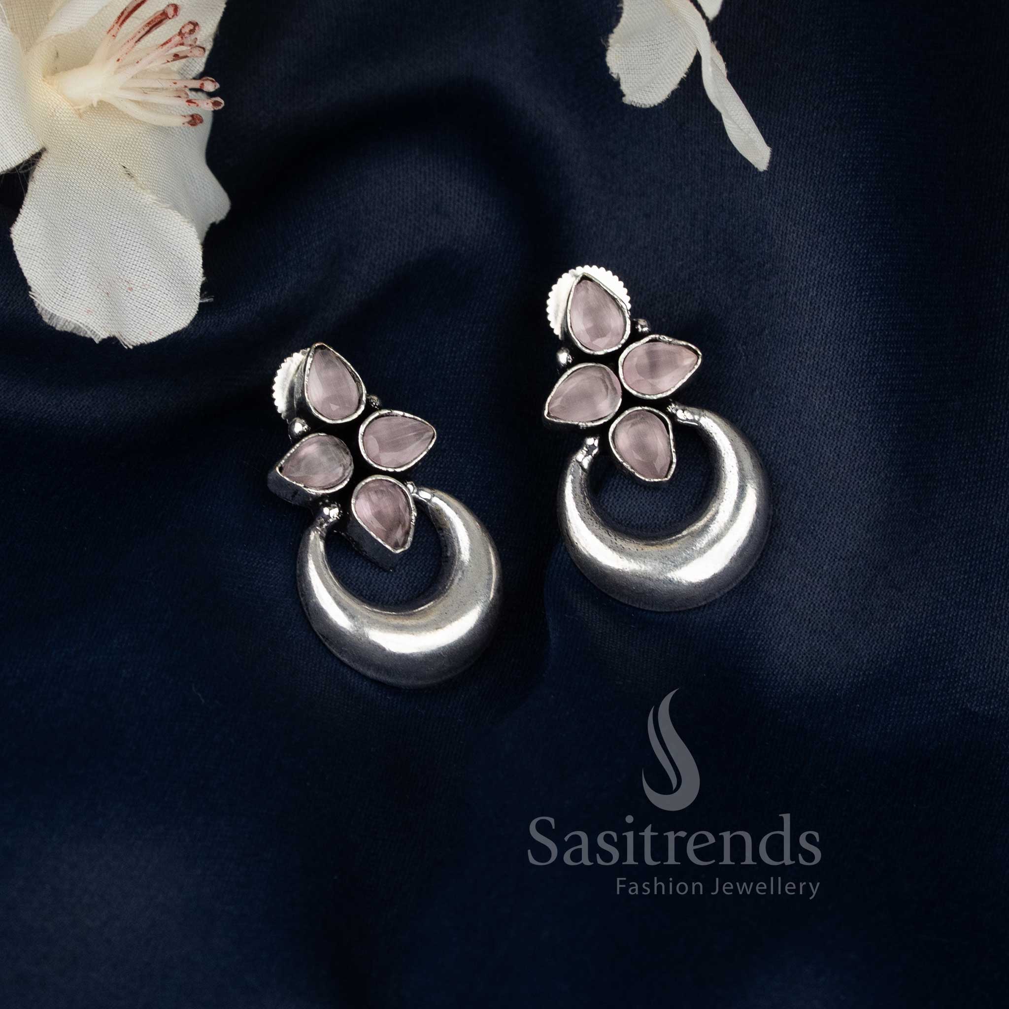 Graceful pink oxidised floral half moon motif earrings designed for Navaratri celebrations and ethnic festive glamour by Sasitrends