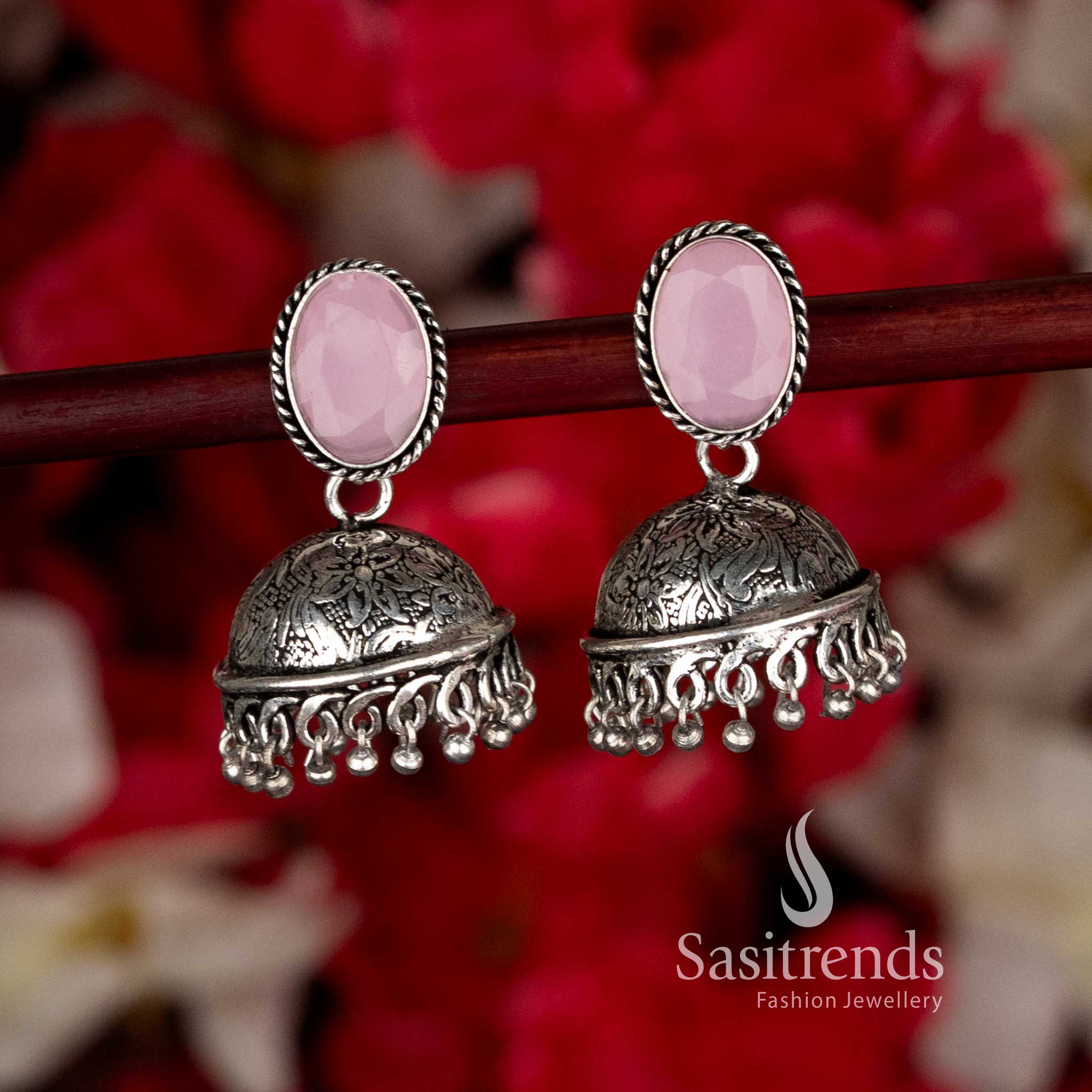 Elegant pink oxidised oval stone jhumka earrings with tiny bead drops crafted for party glamour and black saree wear by Sasitrends