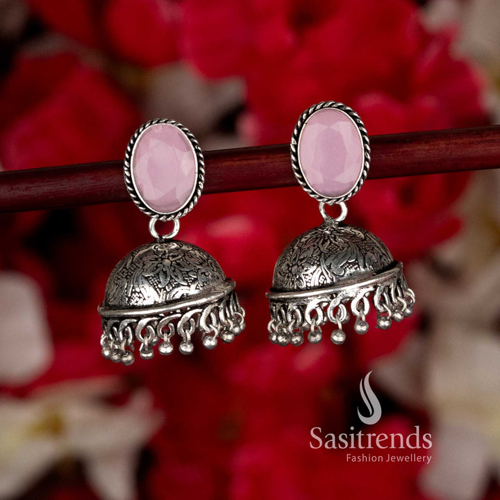 Elegant pink oxidised oval stone jhumka earrings with tiny bead drops crafted for party glamour and black saree wear by Sasitrends
