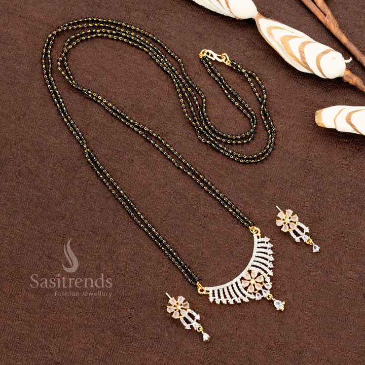 Exquisite pink American Diamond pendant set with a floral design, paired with a micro gold plated Mangalsutra chain and matching earrings, perfect for traditional jewellery lovers - Sasitrends