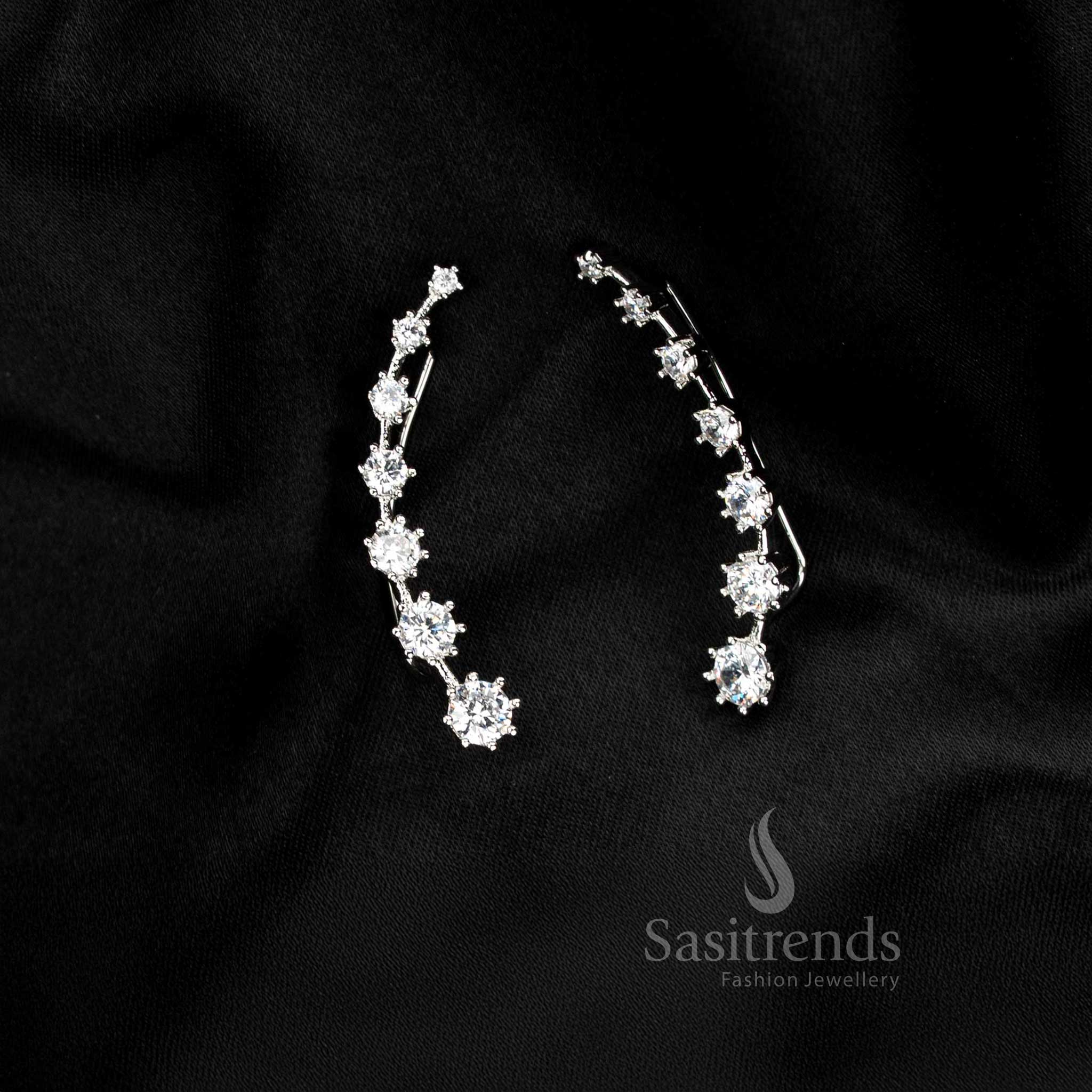 Silver AD crystal line ear climber earcuff with a smooth linear glow, perfect for party edit looks and refined fashion styling – Sasitrends