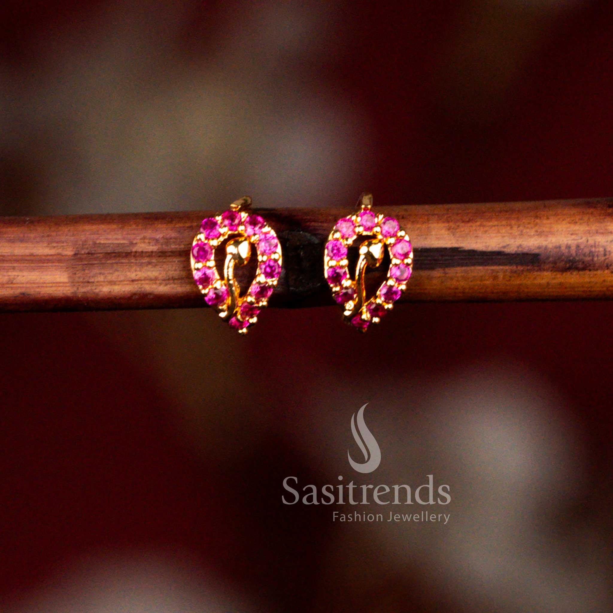 Guaranteed micro gold plated American diamond hinged clasp ring style stud earrings crafted in vibrant ruby red shade for traditional wear – Sasitrends
