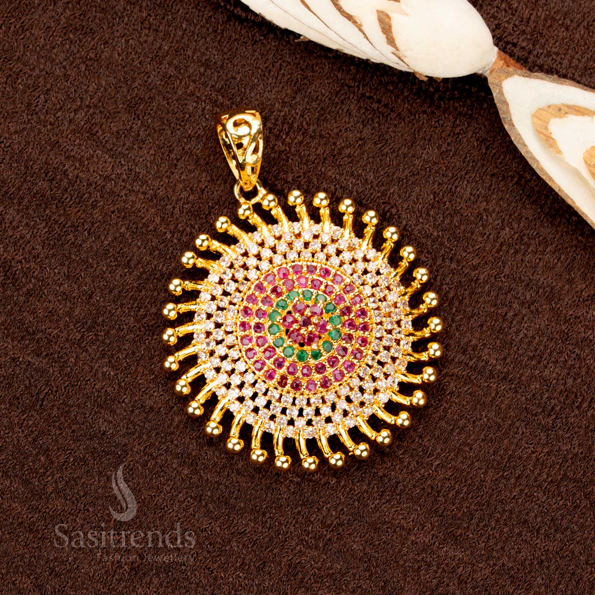An exquisite gold plated Chakara pendant featuring dazzling multi-hued AD stones, radiating charm and elegance for ethnic jewellery lovers