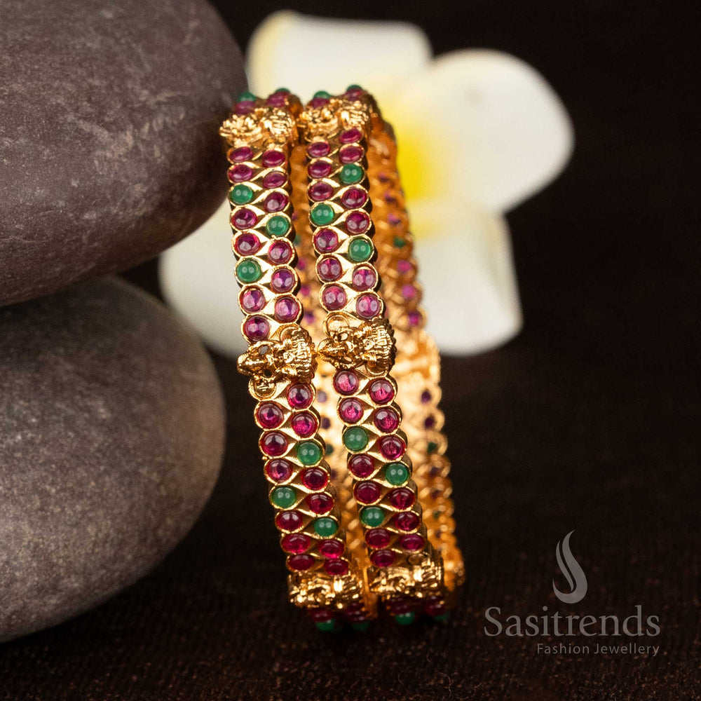 Regal ruby-green temple matte gold plated Lakshmi engraved traditional bangles with exquisite detailing for cultural celebrations - Sasitrends