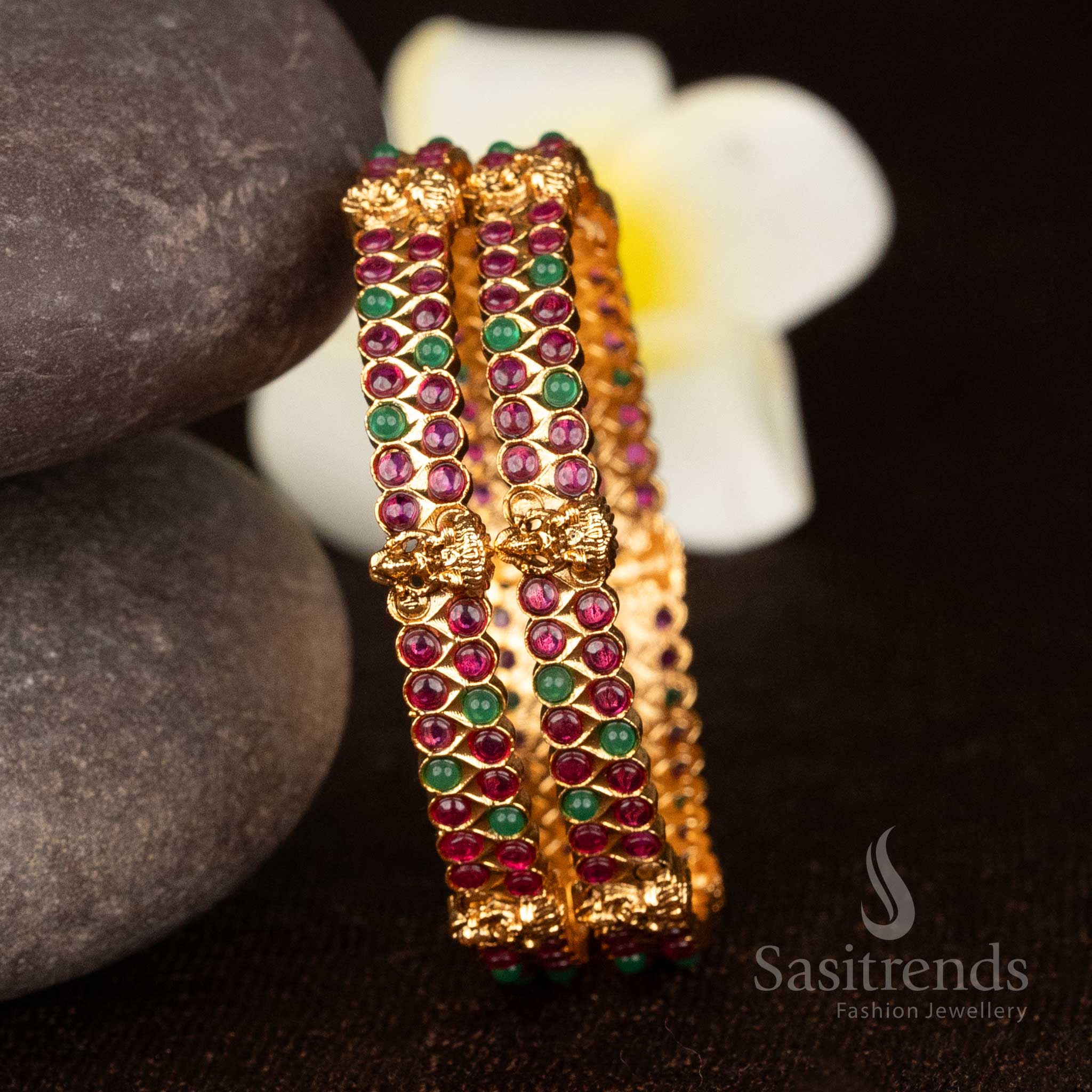 Regal ruby-green temple matte gold plated Lakshmi engraved traditional bangles with exquisite detailing for cultural celebrations - Sasitrends